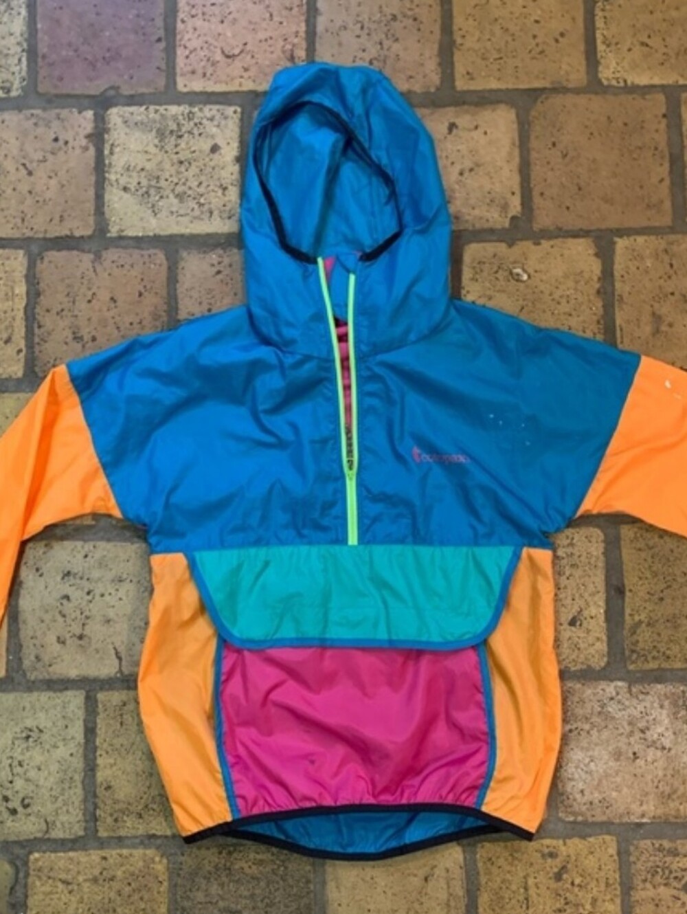 Cotopaxi Clorblock Pullover Windbreaker Jacket in Teal, Orange, Pink